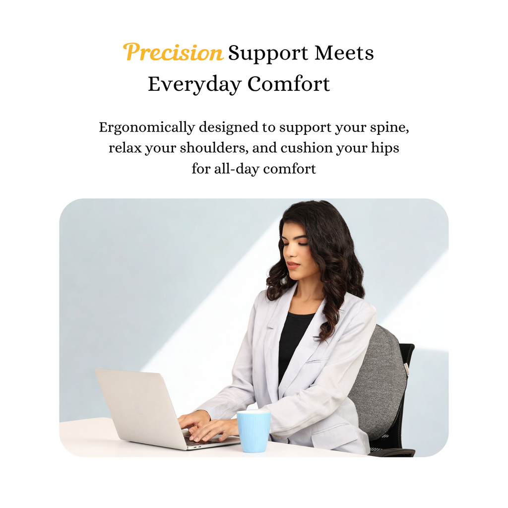 Woman sitting at desk using laptop with memory foam back support for prolonged sitting in office chair